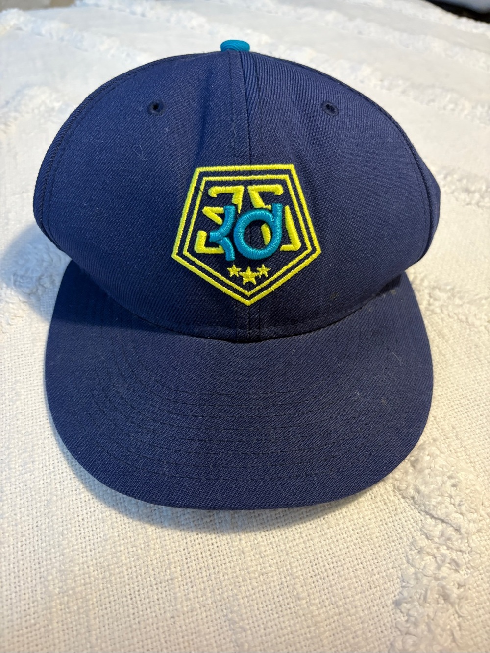 Nike Navy Blue Snapback Hat with Neon Yellow and Teal Logo
